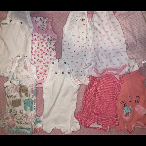 Baby sleepers and onsies. Sizes range from newborn - Picture 2 of 7